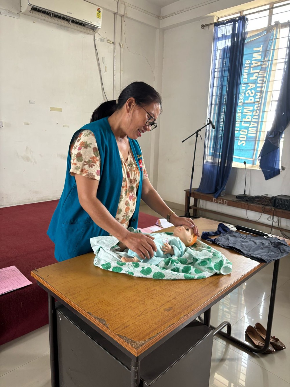 Baby wrapping demonstration by ASHA during Refresher Training at District Hospital Conference Hall, Dimapur.
